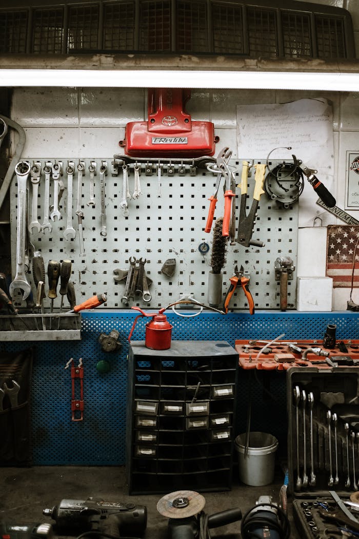 Neatly arranged tools in an auto repair workshop display efficiency and readiness.